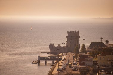 the Torre de Belem or Belem Tower at sunset on the Rio Tejo in Belem near the City of Lisbon in Portugal.  Portugal, Lisbon, October, 2021 clipart