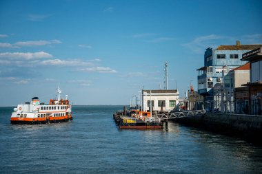 the Public Transport Ferry from Cais de Sodre to Cacilhas at the Rio Tejo near the City of Lisbon in Portugal.  Portugal, Lisbon, October, 2021