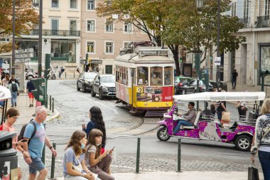 a traditional Lisbon Tram on the streets of Chiado in the City of Lisbon in Portugal.  Portugal, Lisbon, October, 2021