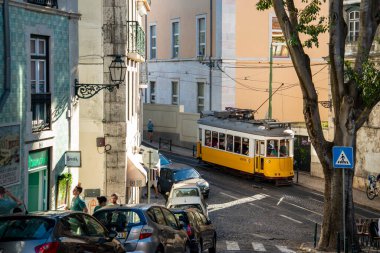 a traditional Lisbon Tram on the streets of Chiado in the City of Lisbon in Portugal.  Portugal, Lisbon, October, 2021