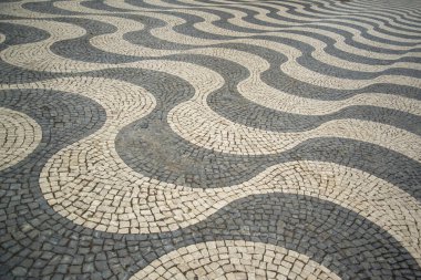Stone Paving at the Rossia Square in Baixa in the City of Lisbon in Portugal.  Portugal, Lisbon, October, 2021