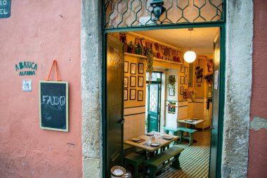 a traditional Fado Music Restaurant in a street and alley in Alfama in the City of Lisbon in Portugal.  Portugal, Lisbon, October, 2021