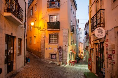 a street and alley in Alfama in the City of Lisbon in Portugal.  Portugal, Lisbon, October, 2021