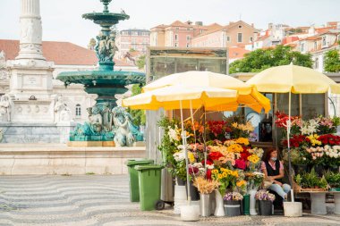 a flower shop at the Rossia Square in Baixa in the City of Lisbon in Portugal.  Portugal, Lisbon, October, 2021