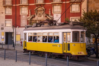 a traditional Lisbon Tram on the streets of Alfama in the City of Lisbon in Portugal. Portugal, Lisbon, October, 2021