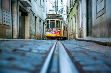 a traditional Lisbon Tram on the streets of Alfama in the City of Lisbon in Portugal. Portugal, Lisbon, October, 2021