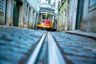 a traditional Lisbon Tram on the streets of Alfama in the City of Lisbon in Portugal. Portugal, Lisbon, October, 2021