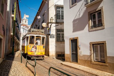 a traditional Lisbon Tram on the streets of Alfama in the City of Lisbon in Portugal. Portugal, Lisbon, October, 2021