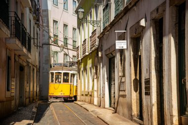 a traditional Lisbon Tram on the streets of Alfama in the City of Lisbon in Portugal. Portugal, Lisbon, October, 2021