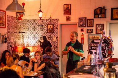 traditional Fado Music in a Fado Restaurant in the city area of Alfama in the City of Lisbon in Portugal. Portugal, Lisbon, October, 2021