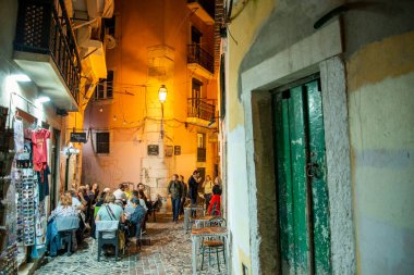 a traditional Fado Music Restaurant in a street and alley in Alfama in the City of Lisbon in Portugal.  Portugal, Lisbon, October, 2021