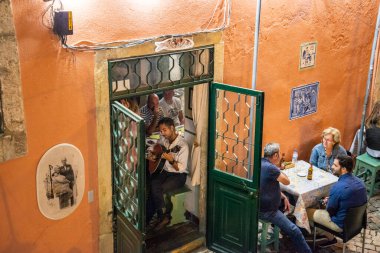 traditional Fado Music in a Fado Restaurant in the city area of Alfama in the City of Lisbon in Portugal. Portugal, Lisbon, October, 2021