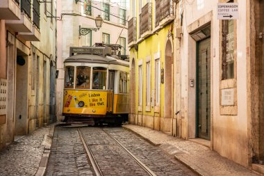 a traditional Lisbon Tram on the streets of Alfama in the City of Lisbon in Portugal. Portugal, Lisbon, October, 2021