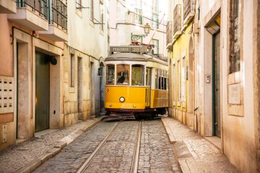 a traditional Lisbon Tram on the streets of Alfama in the City of Lisbon in Portugal. Portugal, Lisbon, October, 2021