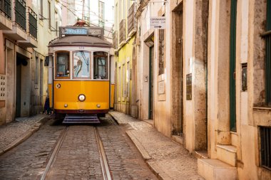a traditional Lisbon Tram on the streets of Alfama in the City of Lisbon in Portugal. Portugal, Lisbon, October, 2021