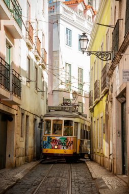 a traditional Lisbon Tram on the streets of Alfama in the City of Lisbon in Portugal. Portugal, Lisbon, October, 2021