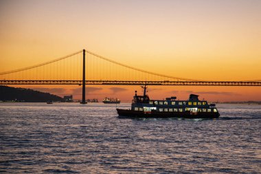 the Public Transport Ferry from Cais de Sodre to Cacilhas at the Rio Tejo near the City of Lisbon in Portugal.  Portugal, Lisbon, October, 2021