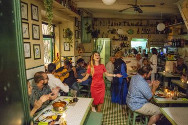 traditional Fado Music in a Fado Restaurant in the city area of Alfama in the City of Lisbon in Portugal. Portugal, Lisbon, October, 2021