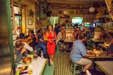 traditional Fado Music in a Fado Restaurant in the city area of Alfama in the City of Lisbon in Portugal. Portugal, Lisbon, October, 2021