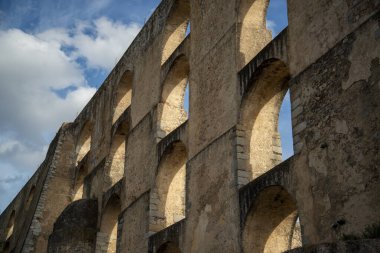 the Amoreira Aqueduct in the city of Elvas in Alentejo in Portugal.  Portugal, Elvas, October, 2021
