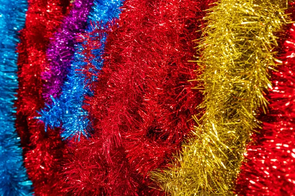 Christmas tinsel closeup, festive background photo Royalty Free Stock Photos