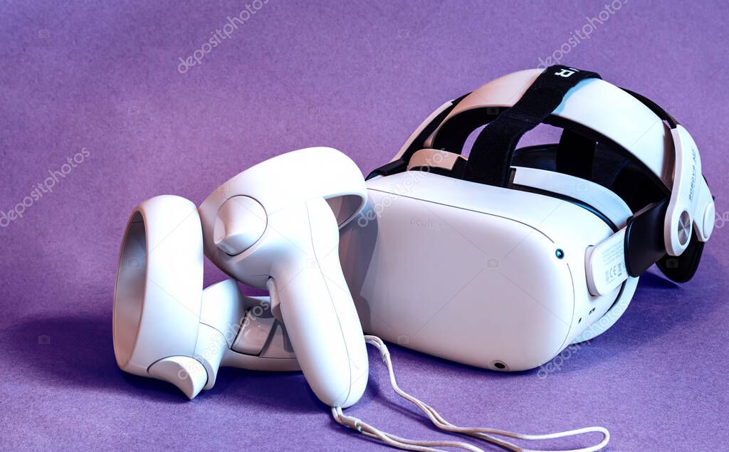 Kaliningrad, Russia - january 10.2022: white new generation VR headset Oculus Quest 2 on very peri background