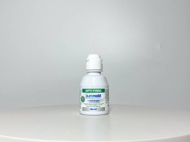 Orlando, FL USA - July 14, 2022:  A bottle of Alcon Optifree Contact Solution on a white background.