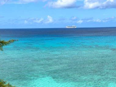 An aerial view of Cemetery Beach on Seven Mile Beach in Grand Cayman Island on a beautiful sunny day.