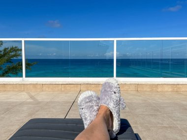 An aerial view of Cemetery Beach on Seven Mile Beach in Grand Cayman Island on a beautiful sunny day with whale slippers.