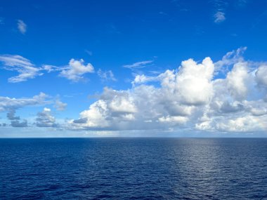 A view of a sunny day on the Caribbean Sea from a cruise ship.