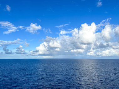 A view of a sunny day on the Caribbean Sea from a cruise ship.