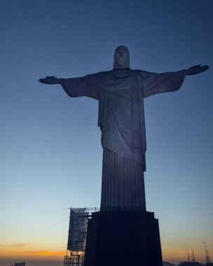 RIO DE JANEIRO, BRAZIL, DECEMBER 21, 2021: Christ the Reedemer, Cristo Redentor, Corcovado, Rio de Janeiro, Brazil. At sunset.