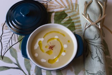 Potato and leek soup with saffron, white wine, and olive oil