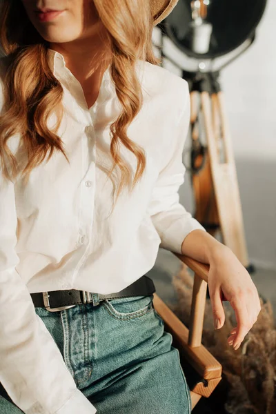 Young Stylish Girl Blue Jeans White Shirt Sits Wooden Chair Stock Image