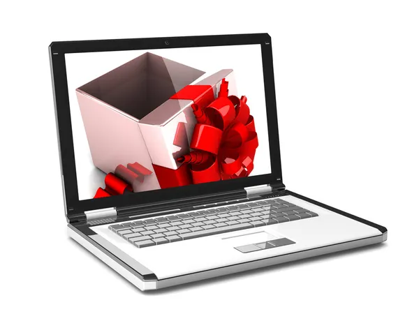 On the laptop screen gift box — Stock Photo, Image