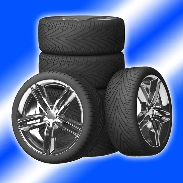 Wheels isolated on blue — Stock Photo, Image