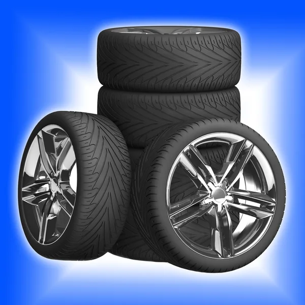 Wheels isolated on blue — Stock Photo, Image