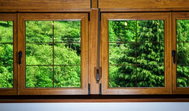 Laminated PVC windows in villagr house clipart