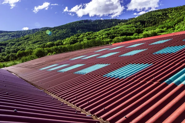 Big red roof over the cow house — Stock Photo, Image