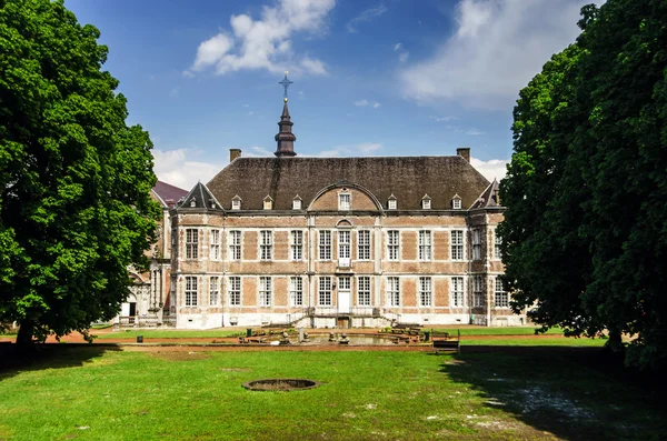 Old abbey in small belgium city — Stock Photo, Image