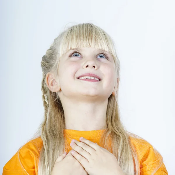 Cute little towhead girl waiting for miracle — Stock Photo, Image