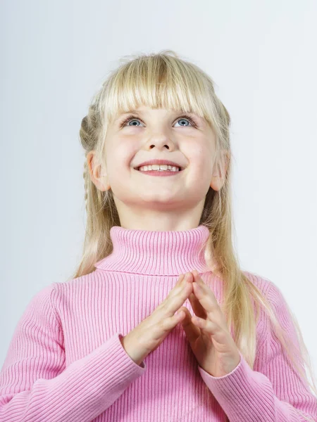Cute little towhead girl waiting for miracle — Stock Photo, Image