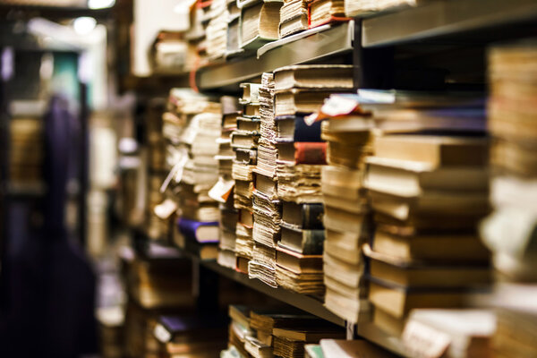 Stacks with many old books