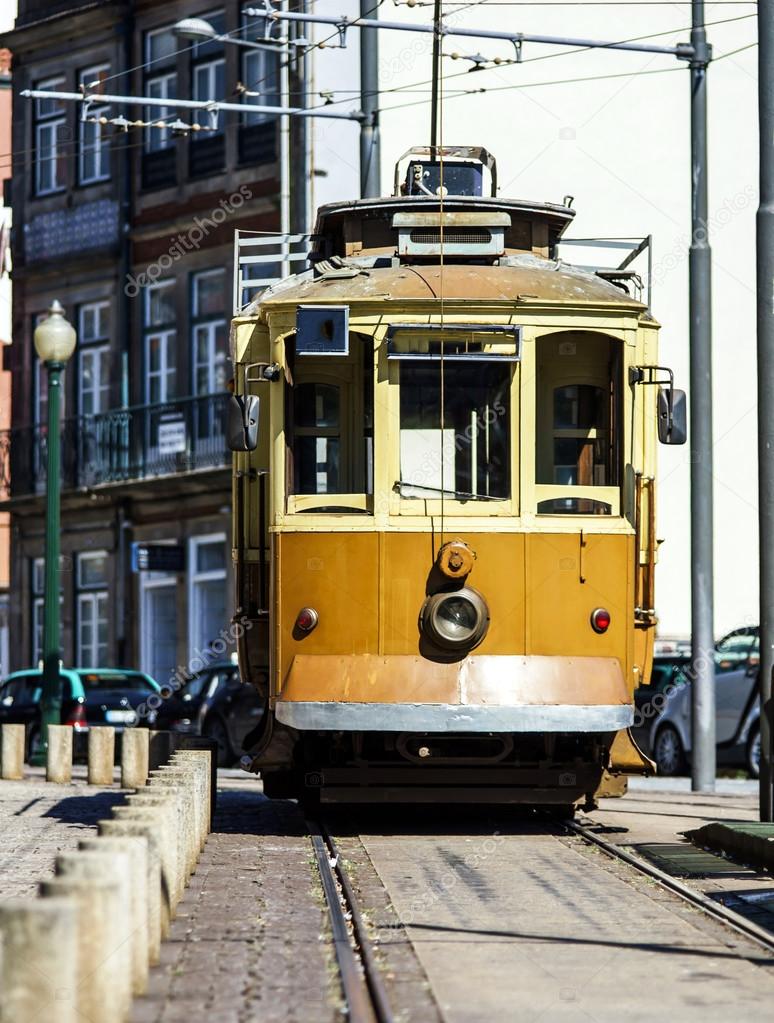 Retro yellow tram on the street