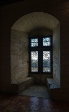 Sun light from small castle window clipart