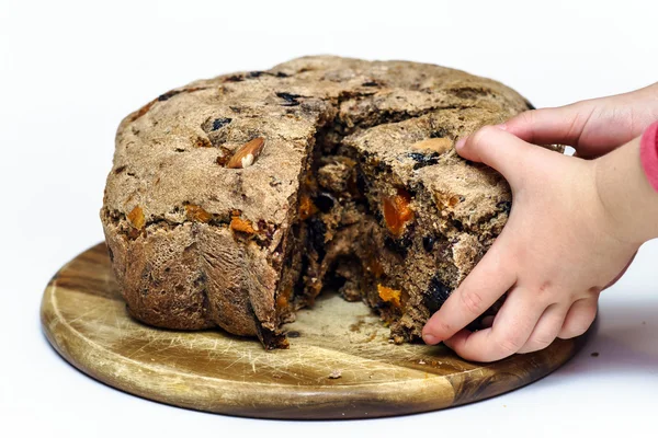 Fresh bread with raisins and plum — Stock Photo, Image