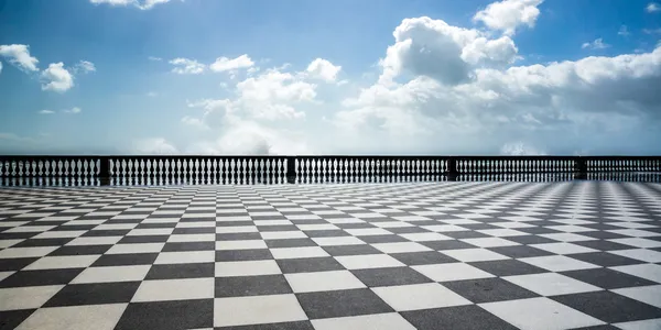 Checkered floor in city square — Stock Photo, Image