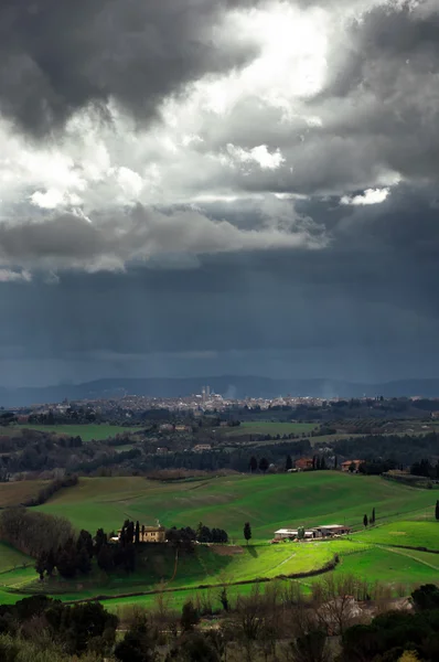 Stormy weather landscape with beautiful light — Stock Photo, Image