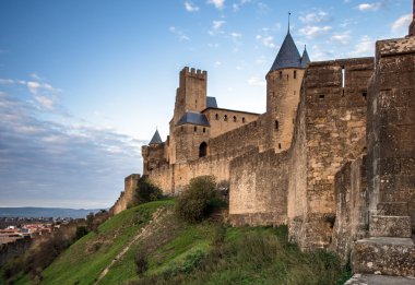 Carcassone fortress at evening sunset. clipart