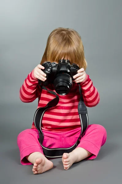 Cute little baby with digital photo camera — Stock Photo, Image